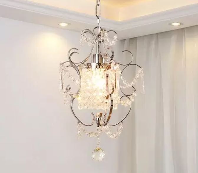 CRYSTAL V.1 - Lampadario in cristallo montato su elegante telaio in metallo disponibile in due colorazioni - Gmk Design